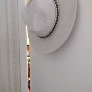 Chic Cream Hat with Subtle Brown Accent
